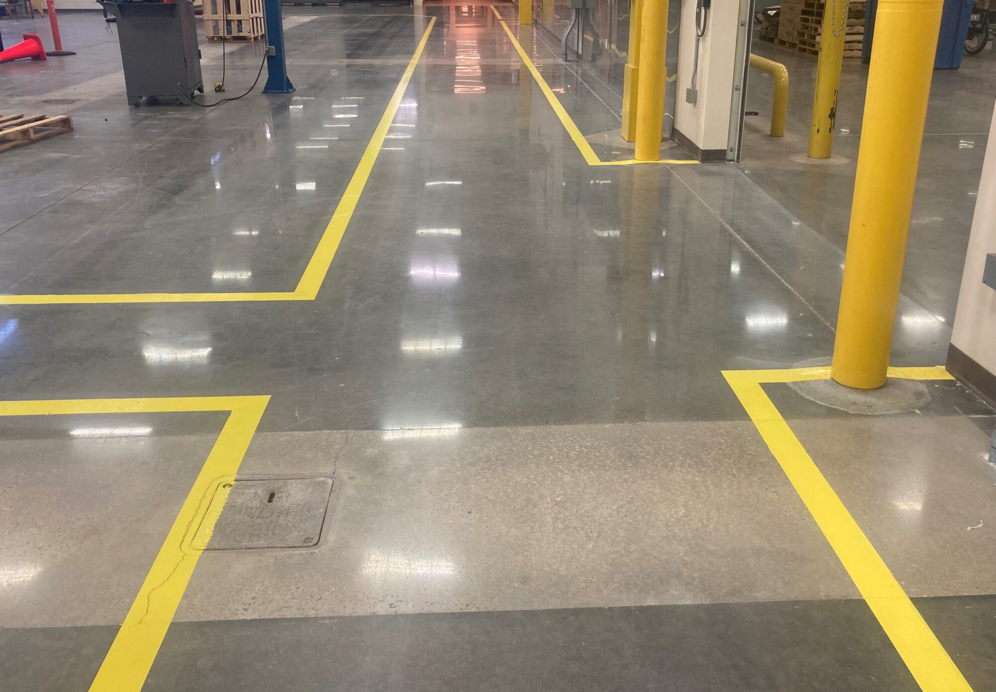 Safety striping, polished concrete, Polished concrete floors, industrial safety, pedestrian walkways in manufacturing, epoxy floor markings, 5S, TeamIA, Industrial Applications Inc, epoxy flooring solutions, flooring contractors Memphis TN, Memphis TN