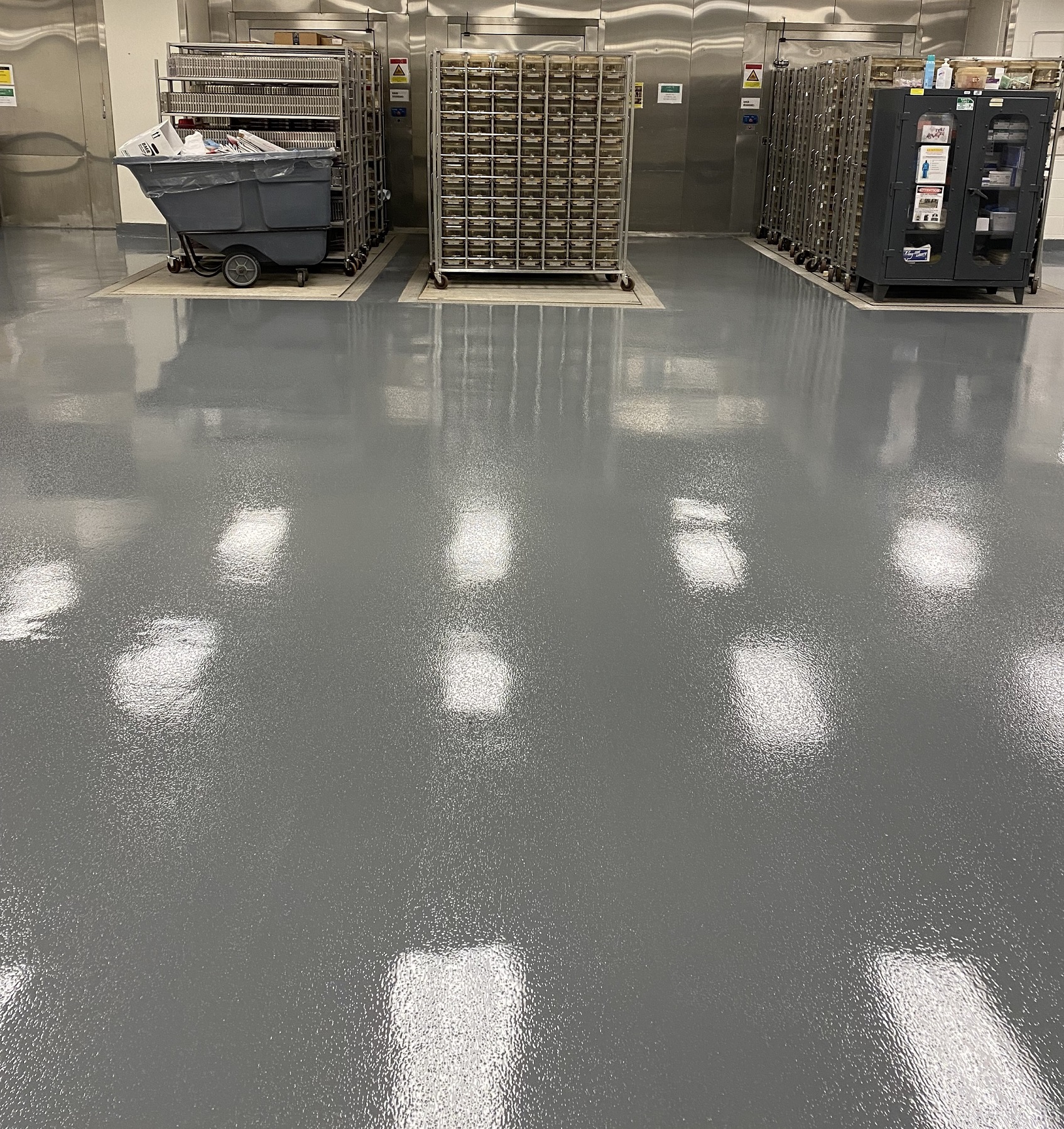 Commercial epoxy flooring, epoxy floor coating, Industrial Applications Inc., TeamIA. Epoxy concrete floor, flooring contractor Memphis TN, Memphis TN, commercial flooring contractor, concrete floor coatings