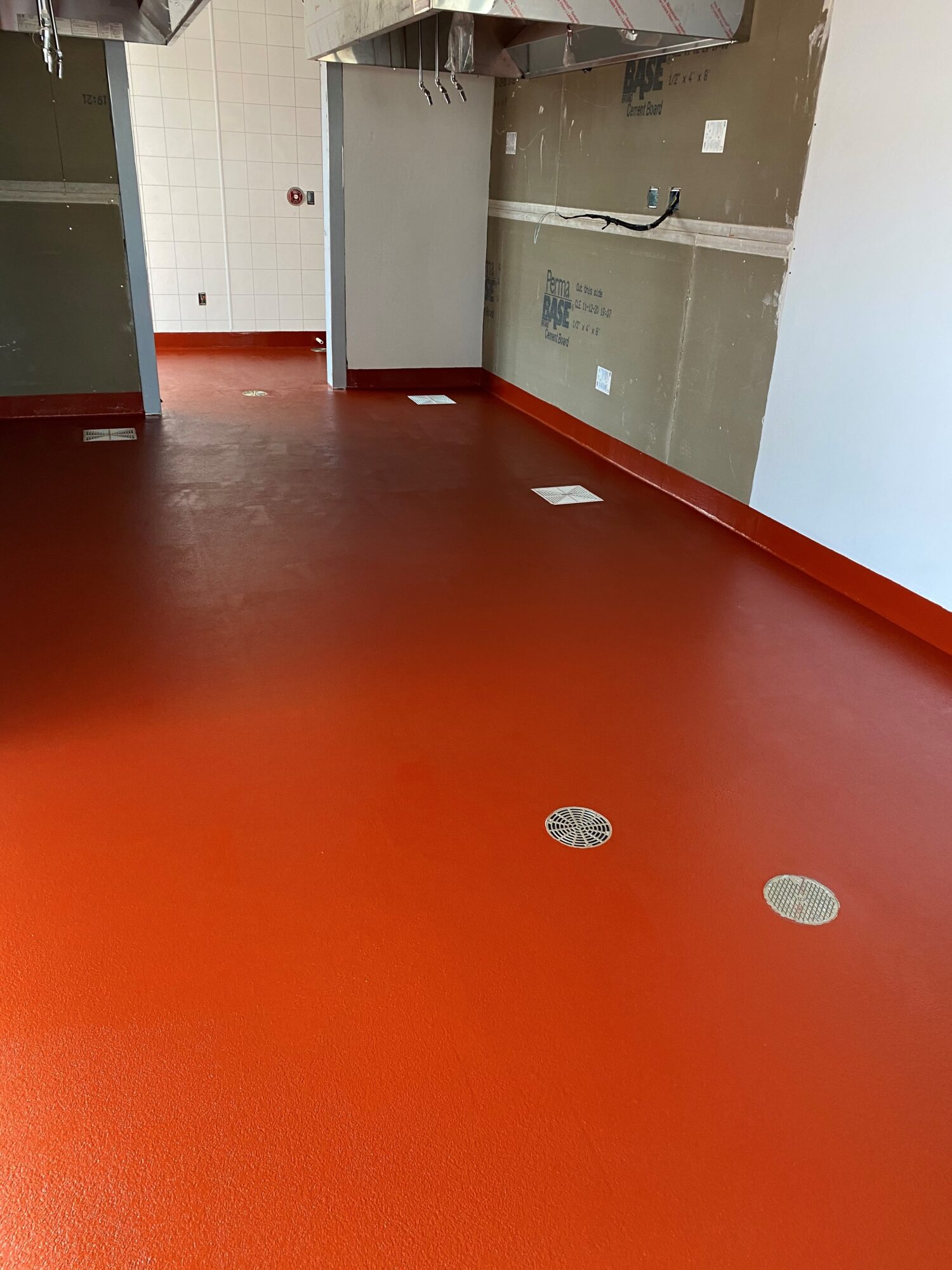 Urethane concrete, commercial kitchen, commercial kitchen flooring, epoxy floors FayettevilleAR, TeamIA, Industrial Applications Inc., IA30yrs