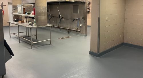 Installed ¼” urethane cement with broadcast, finished with a polyaspartic topcoat No more grout lines – instead they have a maintenance friendly environment, able to withstand thermal shock of kitchen operations, and the floor is clean, highly functional, durable and has the slip resistance to keep their team safe.