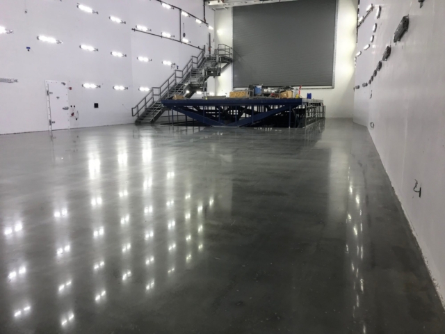 polished concrete tall airplane hangar