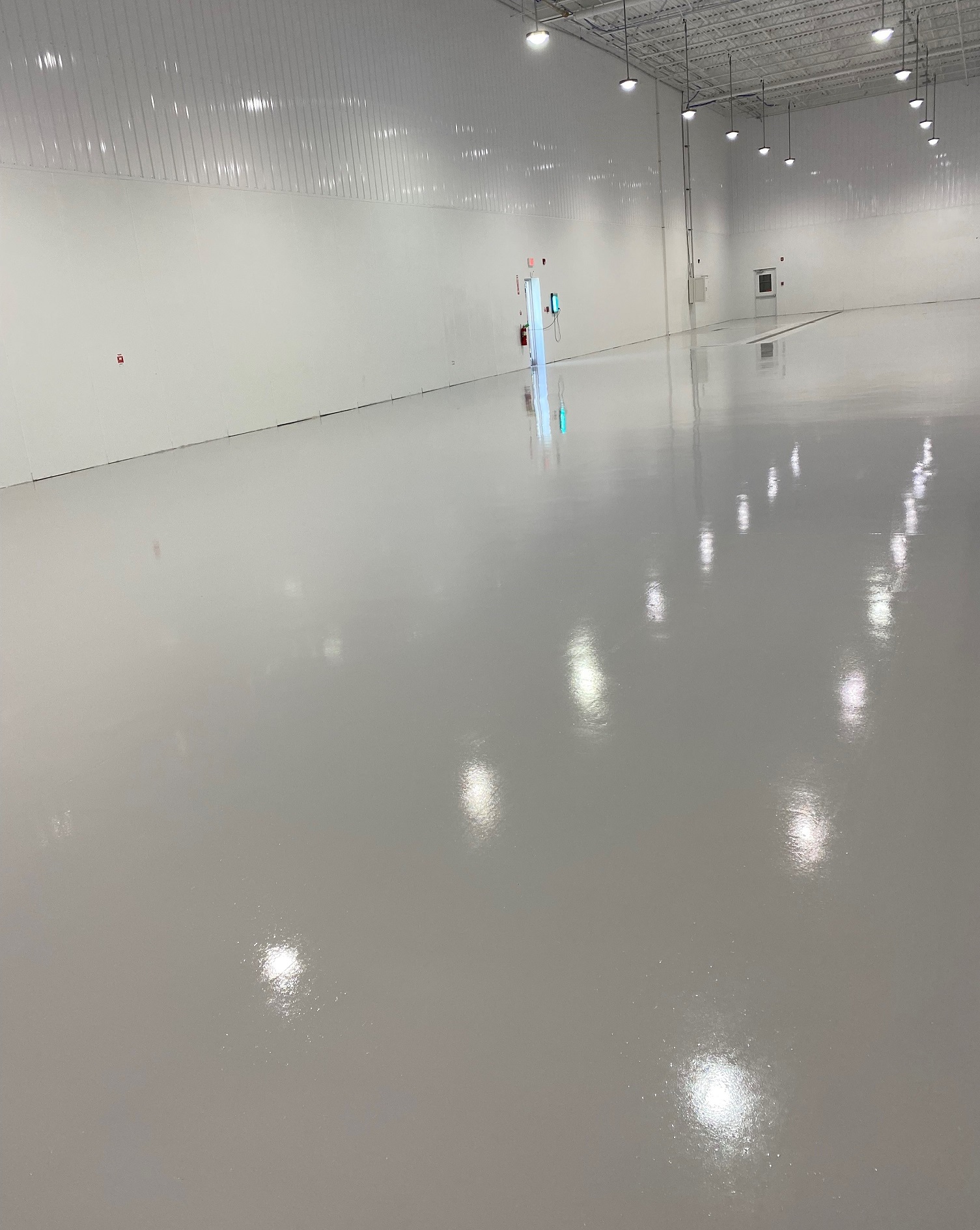 Urethane mortar, epoxy coating systems, floor moisture mitigation, manufacturing floor coatings, non-skid safety flooring, industrial safety, Industrial Applications Inc., TeamIA, flooring contractor Russellville AR, Russellville AR