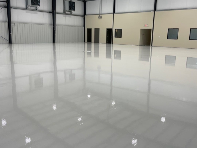 Epoxy/urethane coating systems for airplane hanger - planes and pushback tractors