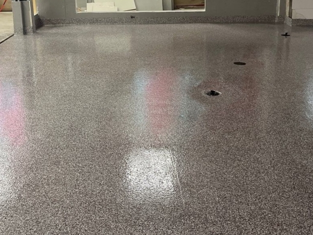 Industrial Applications, Inc. installed decorative flake flooring with MMA with USDA epoxy flooring to commercial kitchens.&nbsp;