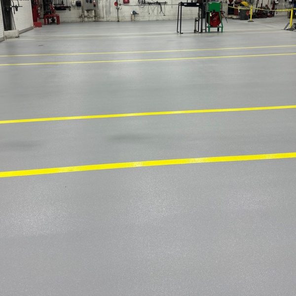 Industrial Applications, Inc. prepped 8,000 sq ft of shop space and installed a urethane concrete flooring system with broadcast and topcoat to truck shop flooring. 