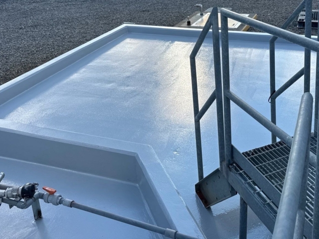 Containment pit coatings at a power plant using moisture mitigating materials.