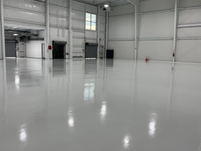 Industrial Applications crews completed 100,000 sq ft of airplane hangar floors in Nashville, TN where they met a tight turnaround schedule requested by the customer. #TeamIA expertly prepped the floor and installed an epoxy system with #RioUHG topcoat and included a glass bead anti-skid additive for increased safety. Epoxy floor coatings, epoxy flooring, airplane hangar floors, airplane hangar epoxy, RioUHG, safety floors, Industrial Applications Inc, TeamIA, IA35years airplane hangar floors - epoxy system with Rio UHG topcoat with glass bead anti-skid additive