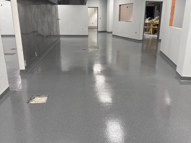 Industrial Applications, Inc. installed a seamless decorative quartz epoxy in a kitchen.&nbsp;