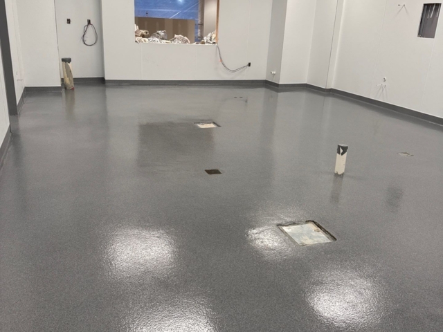 Industrial Applications, Inc. installed a seamless decorative quartz epoxy floor with a polyaspartic topcoat in the commercial kitchen.&nbsp;