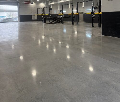 Polished concrete TN, polished concrete auto dealership, low maintenance floors, low maintenance commercial flooring, polished concrete, Industrial Applications Inc, TeamIA, auto dealership floors, SCOFIELD Formula One Stain, durable shop floors