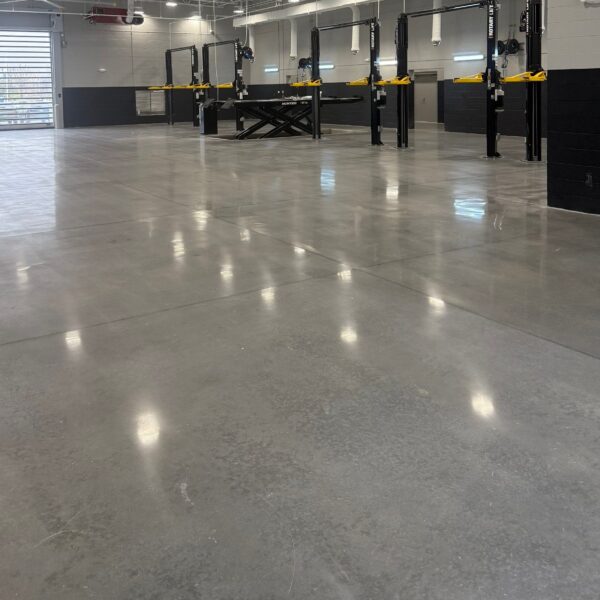 Industrial Applications, Inc. saw cleaned and caulked the joints, ground and polished the surface for an  automobile dealership.