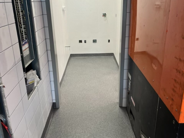 Industrial Applications, Inc. installed MMA coatings to kitchen floor coatings in a hallway.&nbsp;