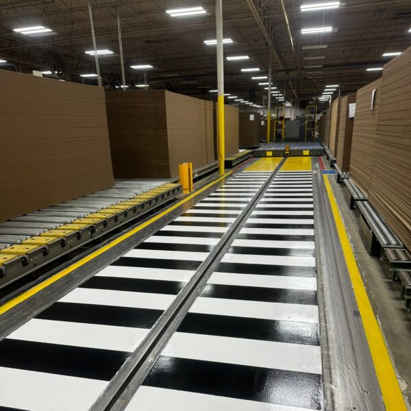 Clear Aisles. Safer Floors. Smoother Operations. Epoxy aisle markings and line striping aren’t just about appearance, they're about safety, efficiency, and control. When a leading American paper and packaging company needed to improve their facility’s traffic flow and visibility, they trusted Industrial Applications Inc. to deliver. We installed high-performance epoxy aisle markings, safety line striping, and polished concrete floors to help create a clean, organized, and OSHA-conscious environment. These 6S-compliant floor systems clearly define pedestrian walkways, equipment zones, and hazard areas, reducing accidents, confusion, and downtime.