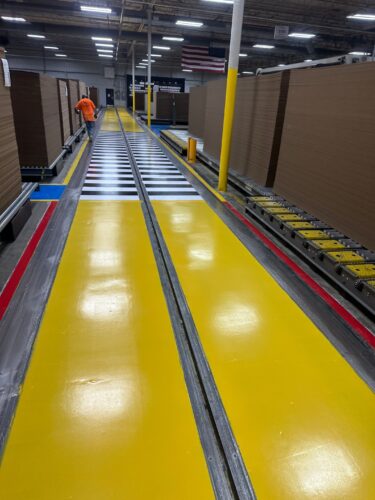When a leading American paper and packaging company needed to improve their facility’s traffic flow and visibility, they trusted Industrial Applications Inc. to deliver. We installed high-performance epoxy aisle markings, safety line striping, and polished concrete floors to help create a clean, organized, and OSHA-conscious environment. These 6S-compliant floor systems clearly define pedestrian walkways, equipment zones, and hazard areas, reducing accidents, confusion, and downtime.