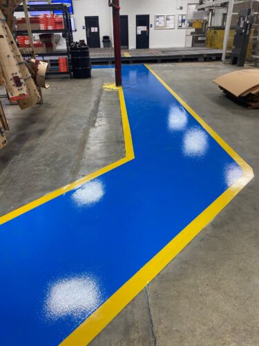 Clear Aisles. Safer Floors. Smoother Operations. Epoxy aisle markings and line striping aren’t just about appearance, they're about safety, efficiency, and control. When a leading American paper and packaging company needed to improve their facility’s traffic flow and visibility, they trusted Industrial Applications Inc. to deliver. We installed high-performance epoxy aisle markings, safety line striping, and polished concrete floors to help create a clean, organized, and OSHA-conscious environment. These 6S-compliant floor systems clearly define pedestrian walkways, equipment zones, and hazard areas, reducing accidents, confusion, and downtime.