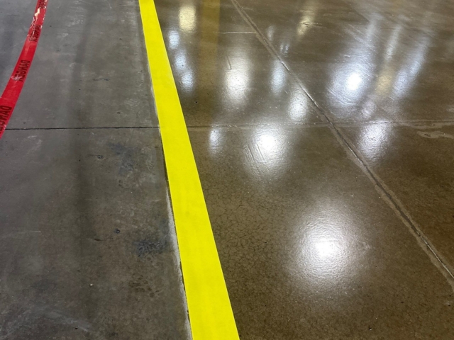 30,000 sq ft of high-performance clear epoxy with a durable urethane topcoat, delivering long-term protection and a clean, professional finish