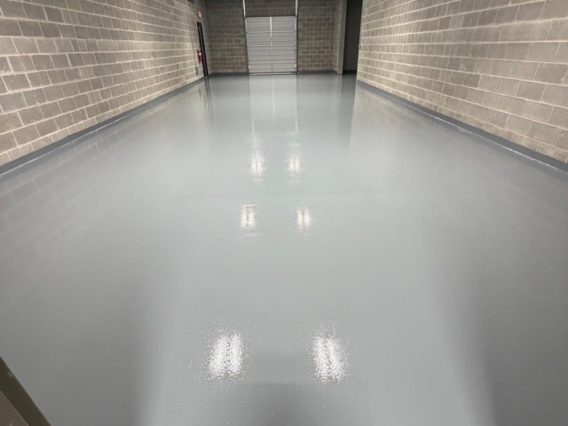 Team IA expertly prepared the existing concrete and installed a Poly-Crete SL system with an epoxy grout coat and a urethane topcoat throughout the facility.