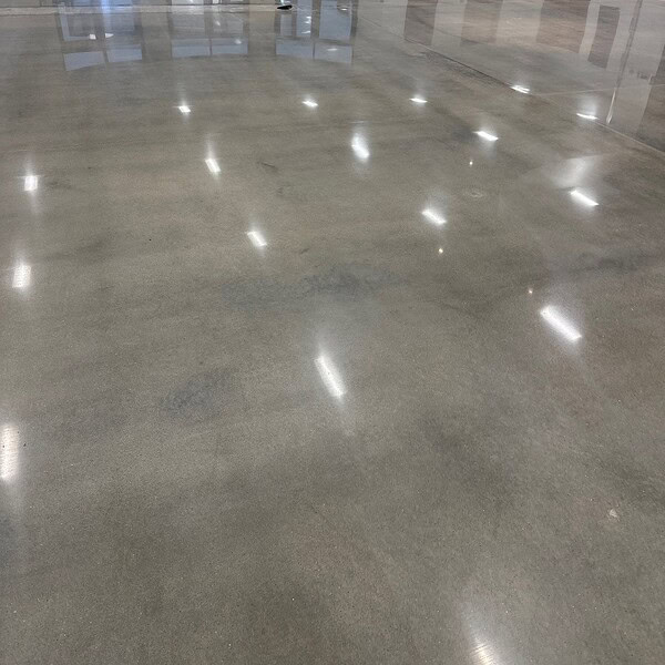 When this local church began a major renovation, they partnered with Industrial Applications Inc to upgrade their main lobby with a long-lasting, low-maintenance flooring solution. Our team removed existing carpet and VCT, addressed residual adhesive, and properly prepared the substrate to ensure a high-quality finish. We then polished over 10,000 square feet of concrete to a 1500 grit finish, delivering a sleek, modern appearance built to handle high foot traffic.