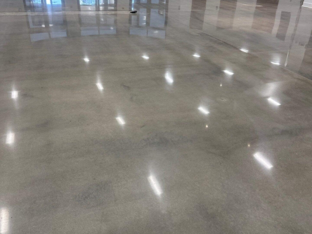 When this local church began a major renovation, they partnered with Industrial Applications Inc to upgrade their main lobby with a long-lasting, low-maintenance flooring solution. Our team removed existing carpet and VCT, addressed residual adhesive, and properly prepared the substrate to ensure a high-quality finish. We then polished over 10,000 square feet of concrete to a 1500 grit finish, delivering a sleek, modern appearance built to handle high foot traffic.