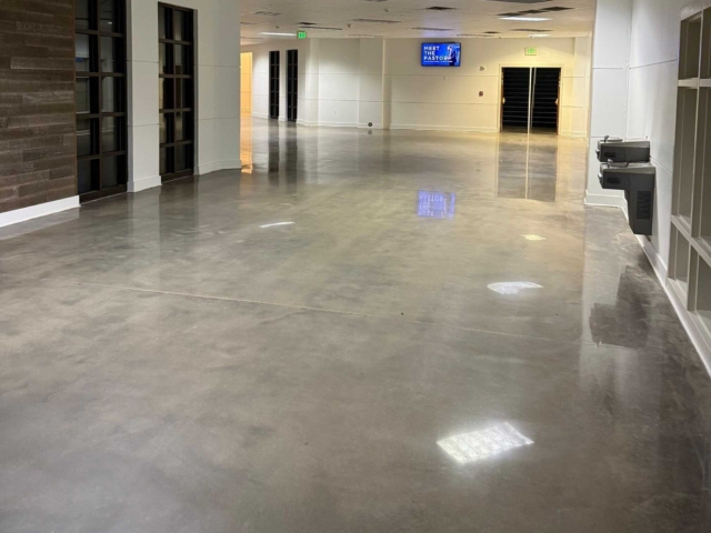 IA removed existing carpet and VCT, addressed residual adhesive, and properly prepared the substrate to ensure a high-quality finish. We then polished over 10,000 square feet of concrete to a 1500 grit finish, delivering a sleek, modern appearance built to handle high foot traffic.