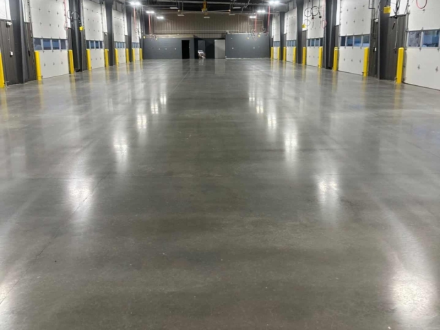 IA designed a polished concrete solution that balanced durability and appearance in the warehouse, we installed a 400 grit satin finish, delivering a more subtle look while providing the durability and slip resistance needed for daily operations.