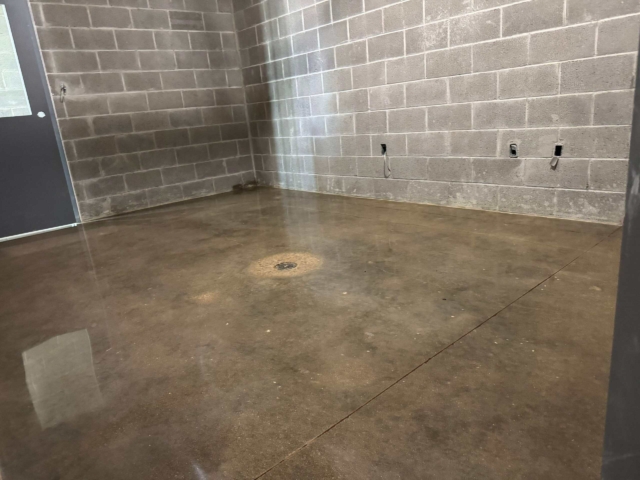 The IA crew hand polished around drains and navigated inconsistent, uneven concrete throughout the space. This type of work demands precision, patience, and experience to get right.