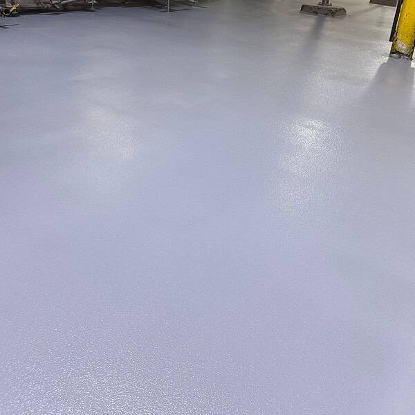Leading contract food manufacturer needed to improve water flow and repair extensive floor damage - IA rebuilt the area using high performance urethane concrete, and installed crowned and properly pitches surfaces to direct water efficiency