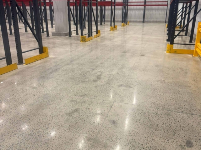 IA crews mechanically cleaned, ground, and prepared the concrete before applying a grout coat and polishing the floor to a durable 400-grit satin finish resulting in a clean, dust-free surface that improved housekeeping, restored functionality, and helped the facility continue serving its community without unnecessary downtime.
