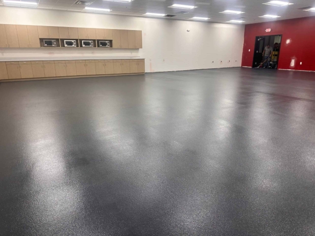 IA installed nearly 5,000 square feet of urethane concrete flooring with an epoxy grout coat and HTS topcoat throughout the facility's breakroom and locker rooms