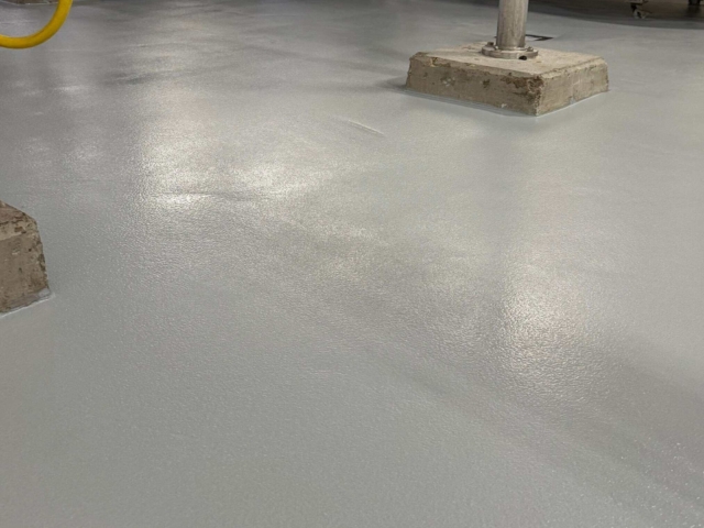 Projects like this require more than installing a floor. They require understanding how a facility operates, coordinating with multiple trades, and executing the work around demanding 24/7/365 production schedules while minimizing operational disruption.